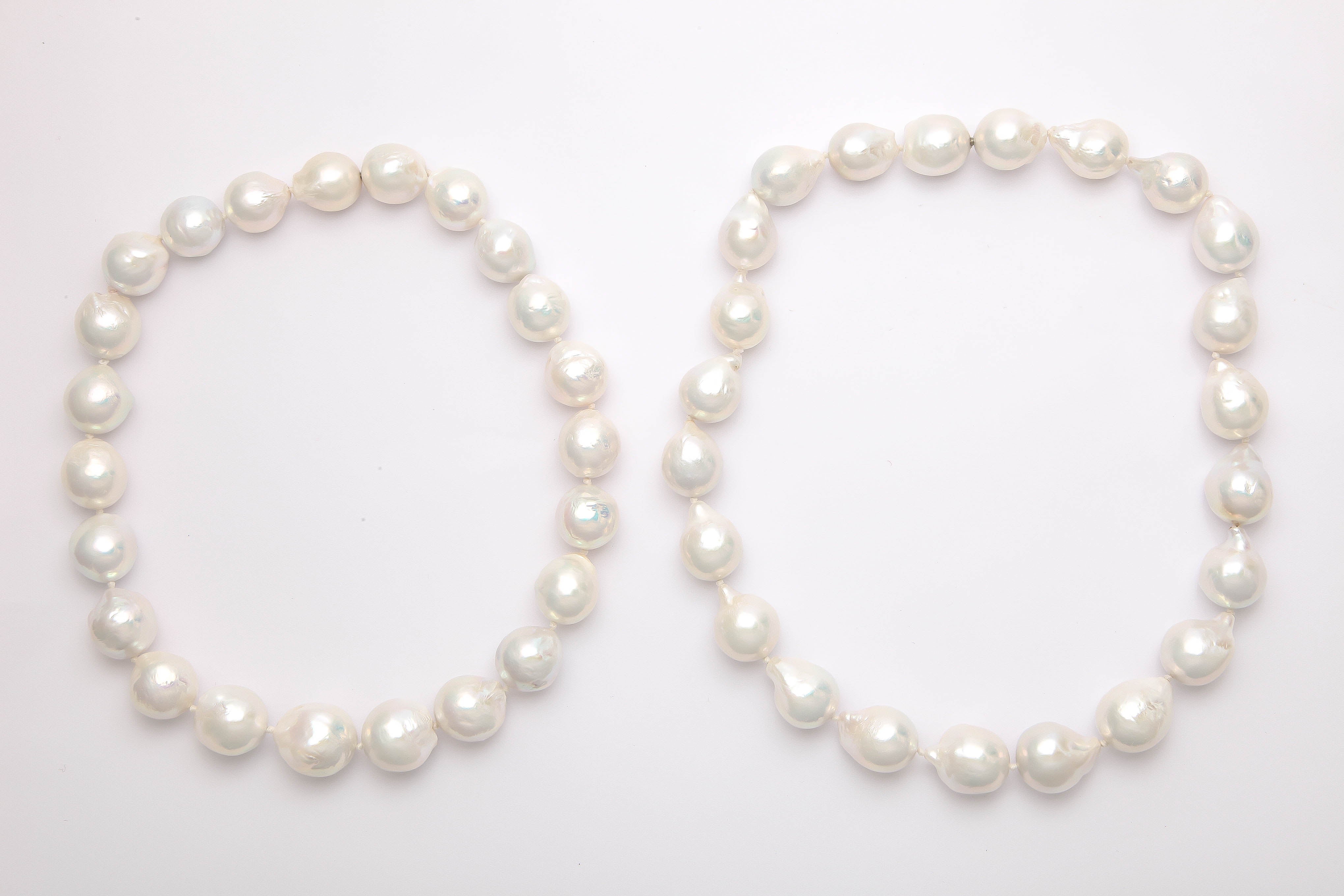 These very high luster pearls have 2 mystery clasps to connect them into 1 long strand or they can nest together as 16.5