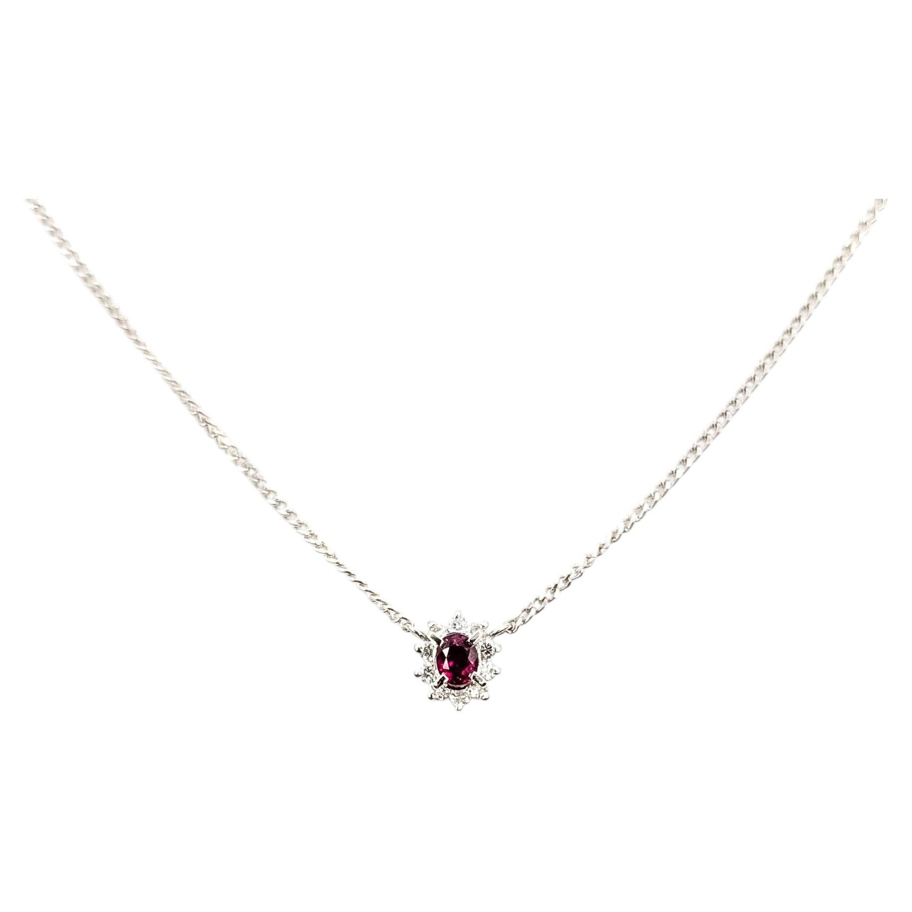 Collier pendentif halo en platine avec rubis et diamants