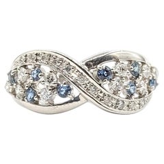 Captivating Alexandrite & Diamond Infinity Ring in Platinum
