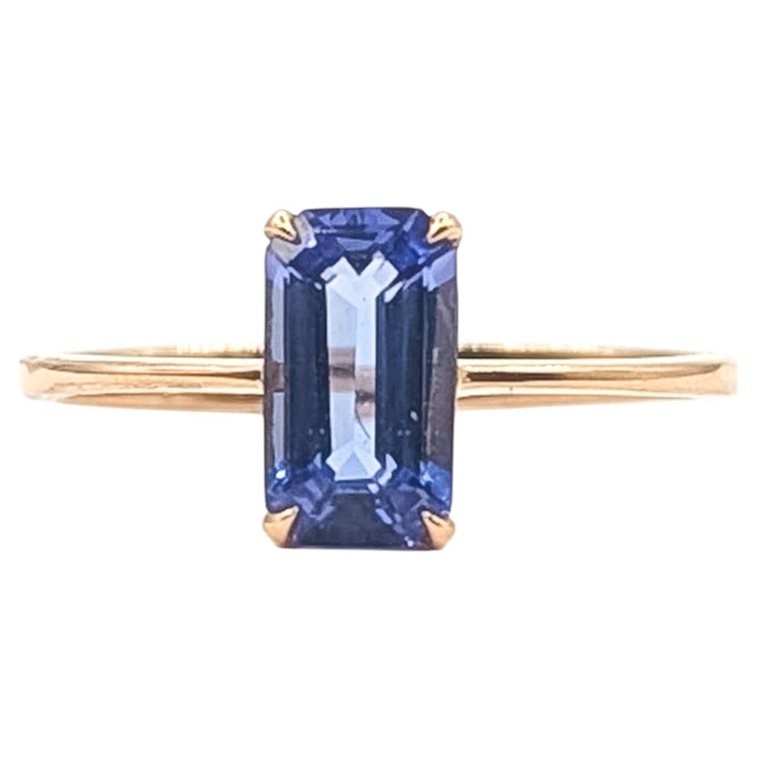 Tapered Emerald Cut Tanzanite Solitaire Ring in 18k Rose Gold