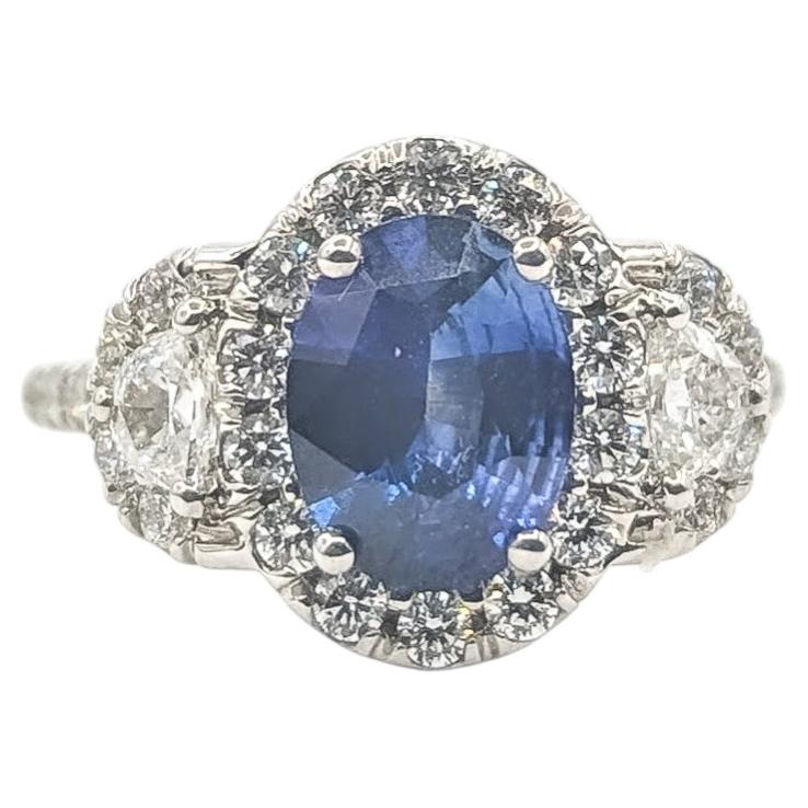 Oval Sapphire and Diamond Cluster Halo Ring in 18k White Gold For Sale