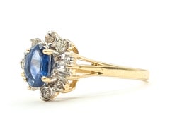Blue Sapphire & Diamond Halo Ring in 14k Yellow Gold