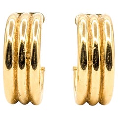 Pendientes de aro con tres crestas en oro amarillo de 14k