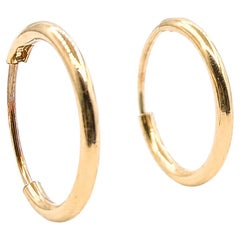 Pendientes de aro clásicos en oro amarillo de 10k