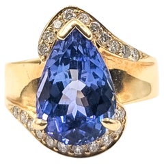 Pear-Shaped Tanzanite and Diamond Bypass Ring in 18K Yellow Gold