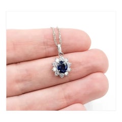 Halo Sapphire & Diamond Pendant in Platinum