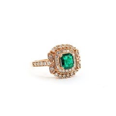 Radiant Emerald & Diamond Halo Ring in 14k Rose Gold