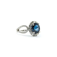 Blue Sapphire & Diamond Halo Ring in 14k White Gold