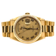 1997 Rolex Day-Date 36 President Champagne Roman Dial 18K Yellow Gold Watch