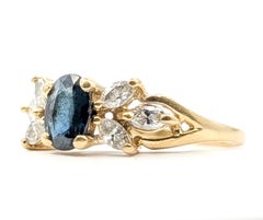 Teal Blue Sapphire and Marquise Diamond Seven-Stone Botanical Ring in 14K Yellow