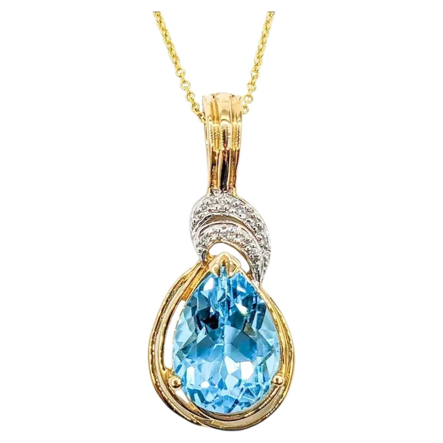 14K Yellow Gold Blue Topaz & Diamond Pendant Necklace For Sale