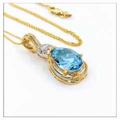 14K Yellow Gold Blue Topaz & Diamond Pendant Necklace