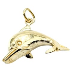 Playful Dolphin Pendant in 14k Yellow Gold