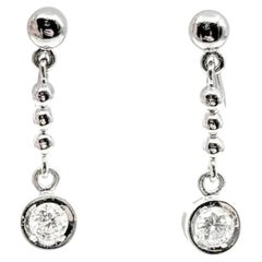 Diamond Dangle Earrings in Platinum