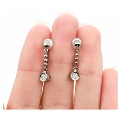 Diamond Dangle Earrings in Platinum