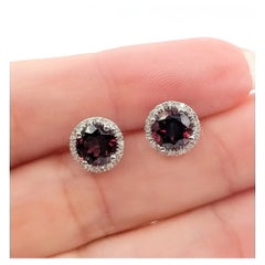 Garnet & Diamond Stud Earrings in 14k White Gold