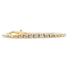 Bracciale tennis con diamanti in oro giallo 14k