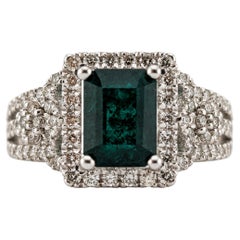 1.61 Carat Emerald and Diamond Halo Ring in Platinum