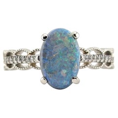 Anillo de platino con ópalo negro ovalado y diamantes, con acabado milgrain - GIA 2245085148