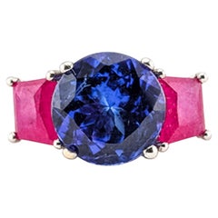 Anello a tre pietre con tanzanite, rubino e diamanti in platino 950