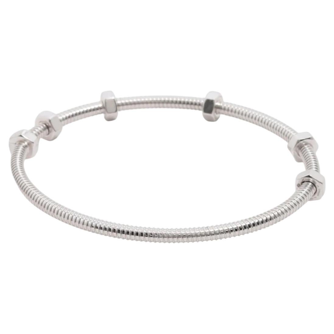 Who designed the Cartier Ecrou?