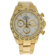 Rolex Daytona 116508 en or jaune 18 carats, cadran champagne, avec sa carte