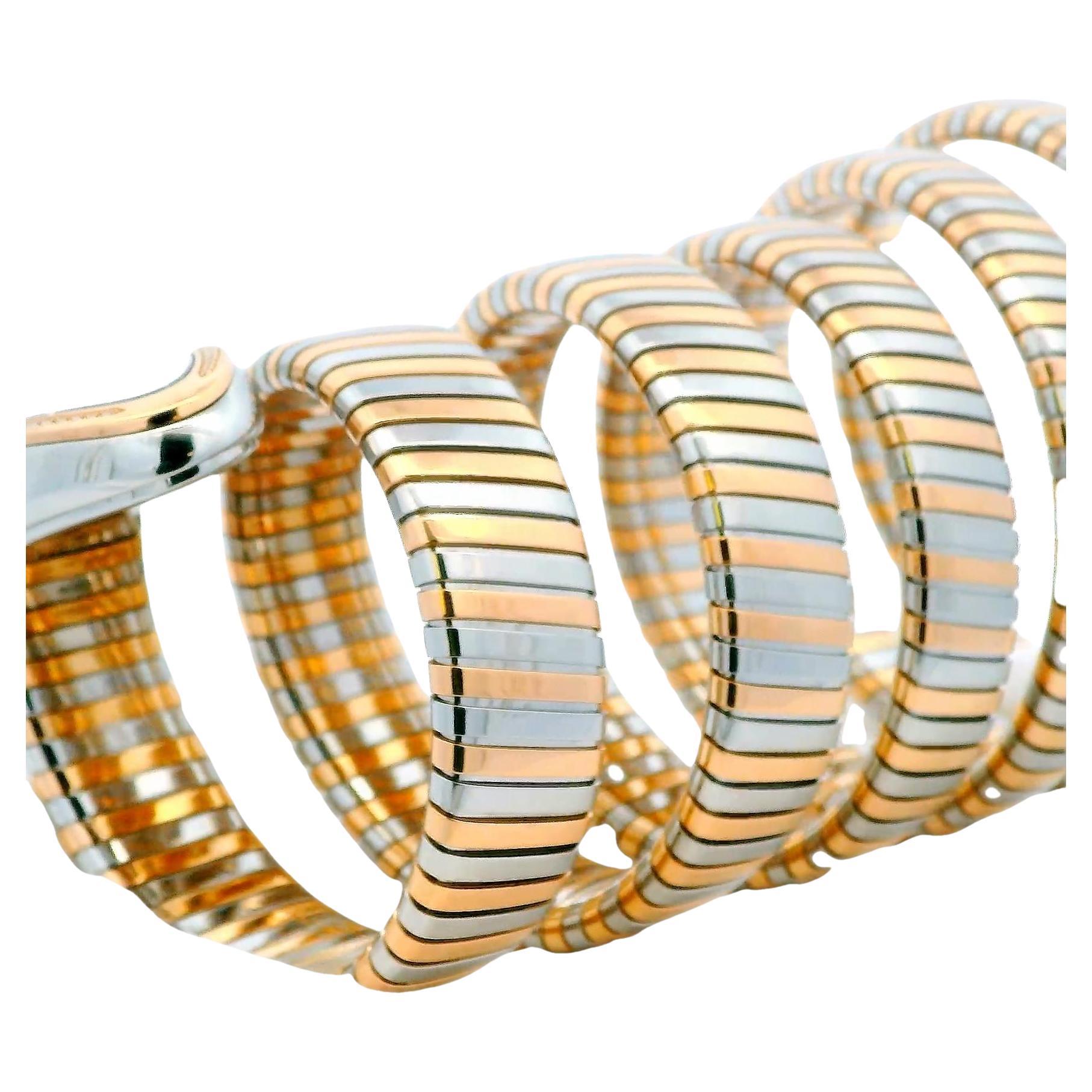 Reloj Bvlgari Serpenti Tubogas SP35 SPG para mujer. Caja de acero inoxidable de 35 mm. Bisel engastado con diamantes de fábrica y oro rosa de 18 quilates. Esfera negra con agujas e índices de oro rosa y marcador horario de números romanos. Tubogas ,