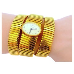 Bvlgari tubogas backwind central e/w oval watch tapered bracelet