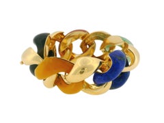 Pulsera clásica grande de eslabones de oro amarillo de 18 quilates con varias piedras