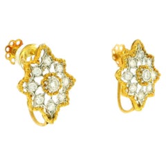 Pendientes «rombi» de Mario Buccellati con estrella alargada de 8 pt