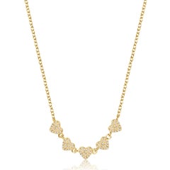 Collana con cinque cuori in oro giallo 14K e diamanti