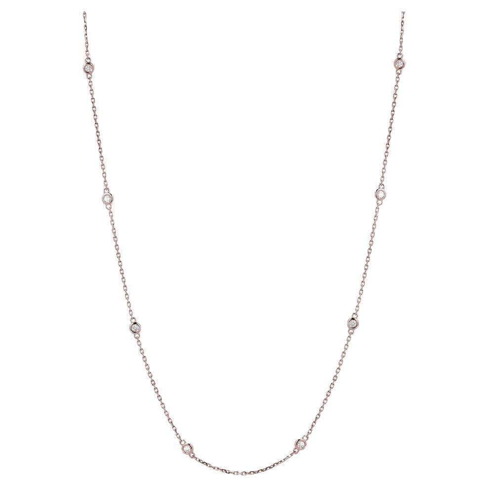 Eight elegant round diamonds set in a bezel setting along a 14k gold chain necklace.

Necklace Information
Gold : 14K Gold
Number of Diamonds : 8
Gold Color : Yellow Gold, Rose Gold, White Gold
Carat Weight : 0.50ct
Necklace Length : 16 
Diamond