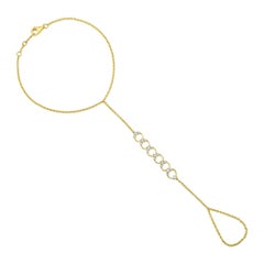 Chaîne à la main cercles célestes en or jaune 14 carats avec 19 diamants