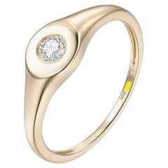 Minimalistischer Siegelring aus 14 Karat Gelbgold mit rundem Diamanten in Lünettenfassung