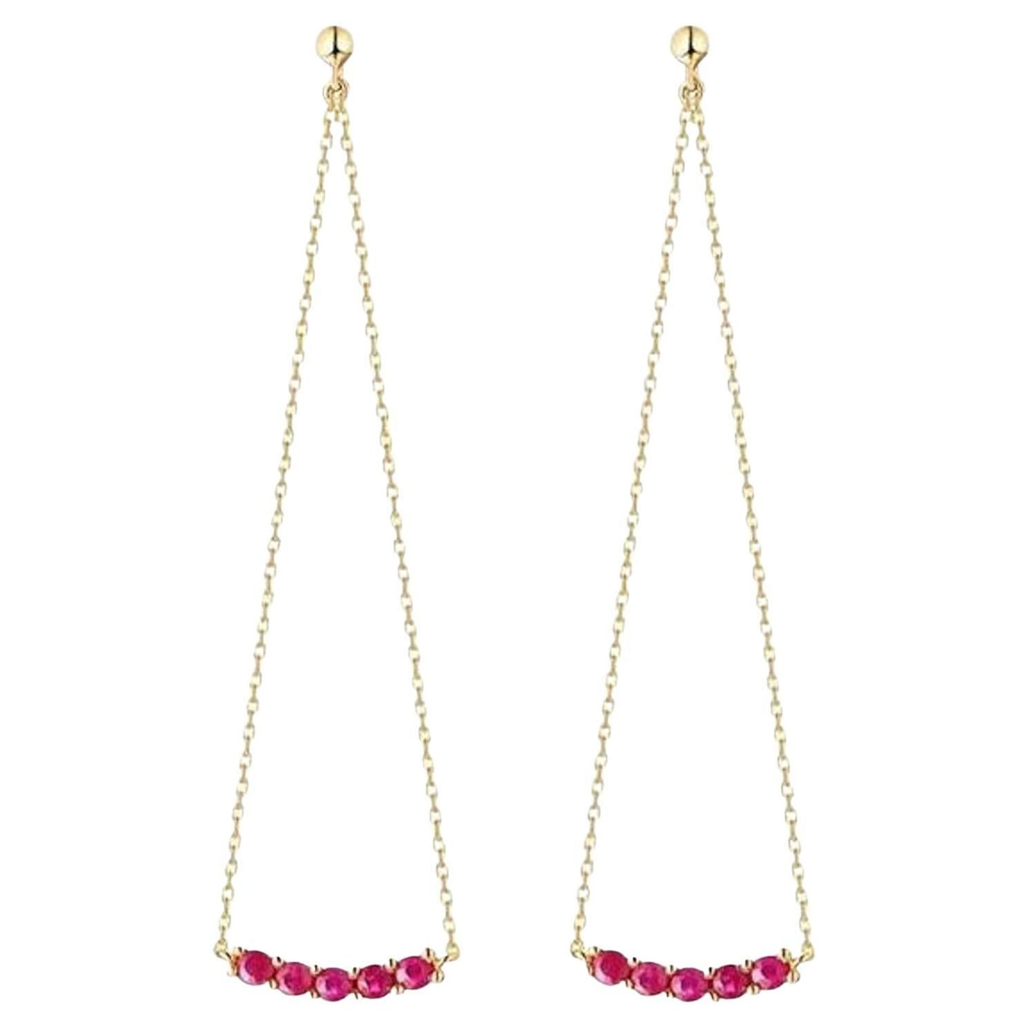 Orecchini con rubino tondo in oro giallo 14K
