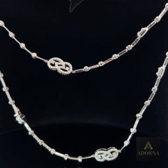 Lange Gliederhalskette aus 14 Karat Weißgold mit ineinandergreifenden Diamanten