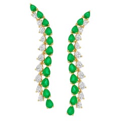 Boucles d'oreilles pendantes en or jaune 18K avec feuilles d'émeraude et diamants
