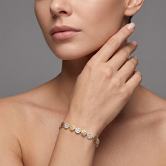 Seven Diamond Lustrous 14K (or 18k upon request) Yellow Gold Diamond Bracelet