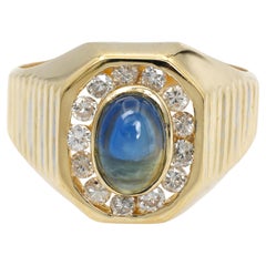 Anillo vintage de oro amarillo de 18 quilates con diamantes y zafiros en cabujón