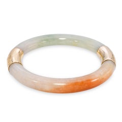 Brazalete vintage de oro amarillo de 14k con jadeíta verde y naranja de grado A según la GIA