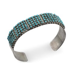 Brazalete de plata de ley con turquesa «ojo de serpiente» de Zuni Pete y Vivian Haloo