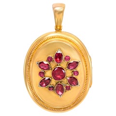 Antique Yellow Gold Foil Backed Tourmaline Floral Motif Locket