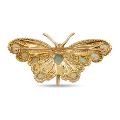 Vintage 13k Yellow Gold Blue Opal and Ruby Butterfly Brooch