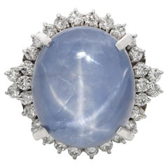 Anillo Halo Vintage de Platino con Zafiro Estrella y Diamantes de 12,82 ct