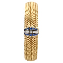 Montre pour femme Movado en or jaune 14k, diamant saphir cadran caché