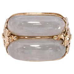 Anillo vintage de Ming con jade gris y detalles florales en oro amarillo