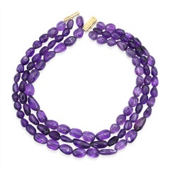 Dreisträngige Perlenkette aus 14-karätigem Gold mit Amethysten