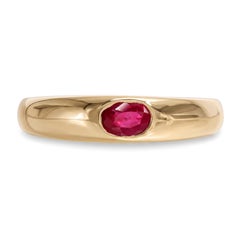 Bague vintage en or jaune 14 carats, sertie à ras de rubis