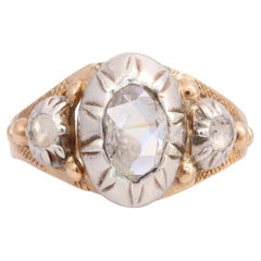 Antique Silver Topped Gold Rose Cut Oval Diamond Three Stone Ring