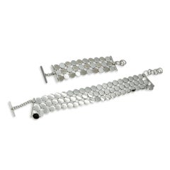 Set Pianegonda composto da collana a maglie a disco in argento, bracciale e orecchini pendenti